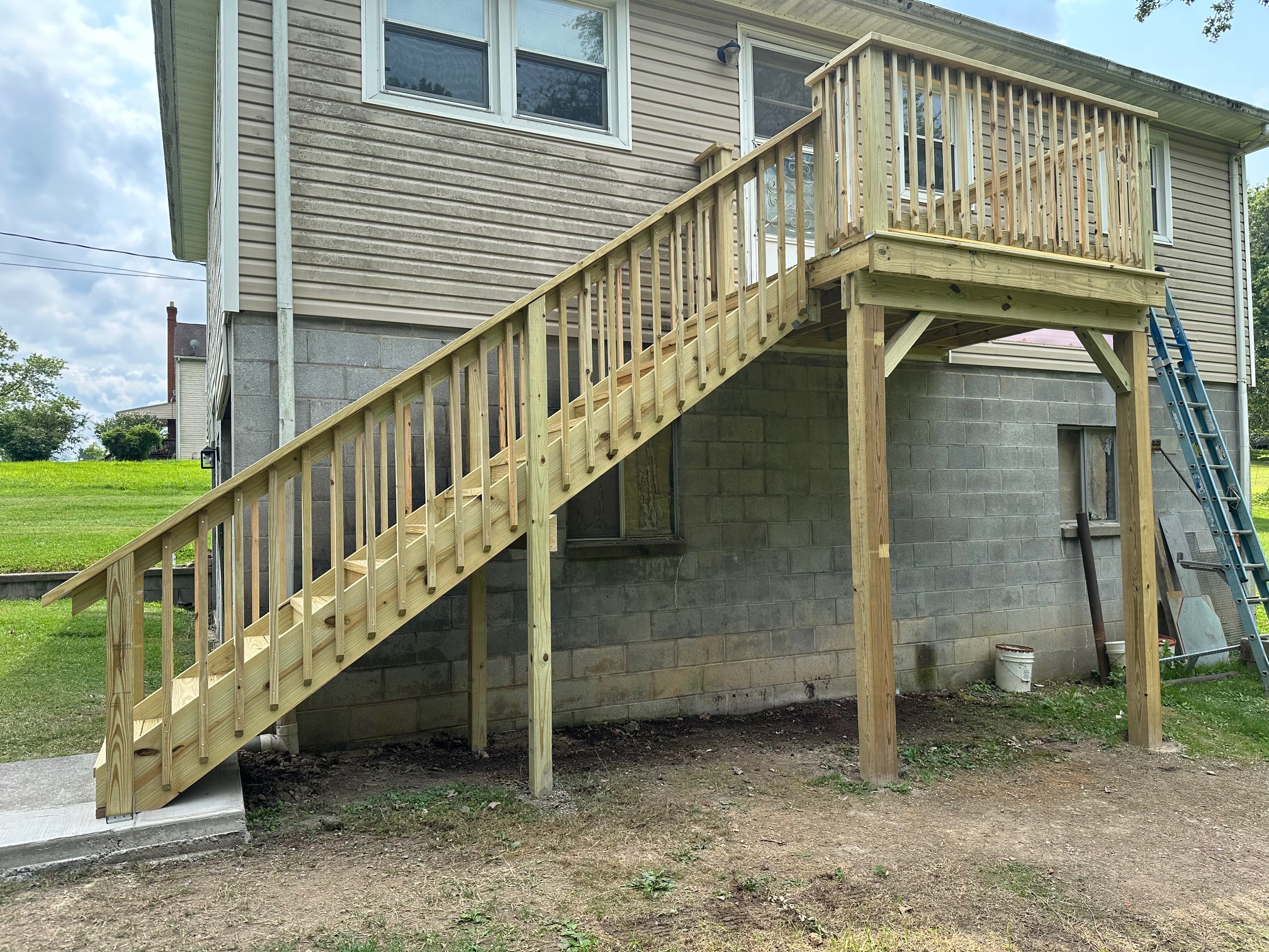Completed back porch with solid-stringer staircase