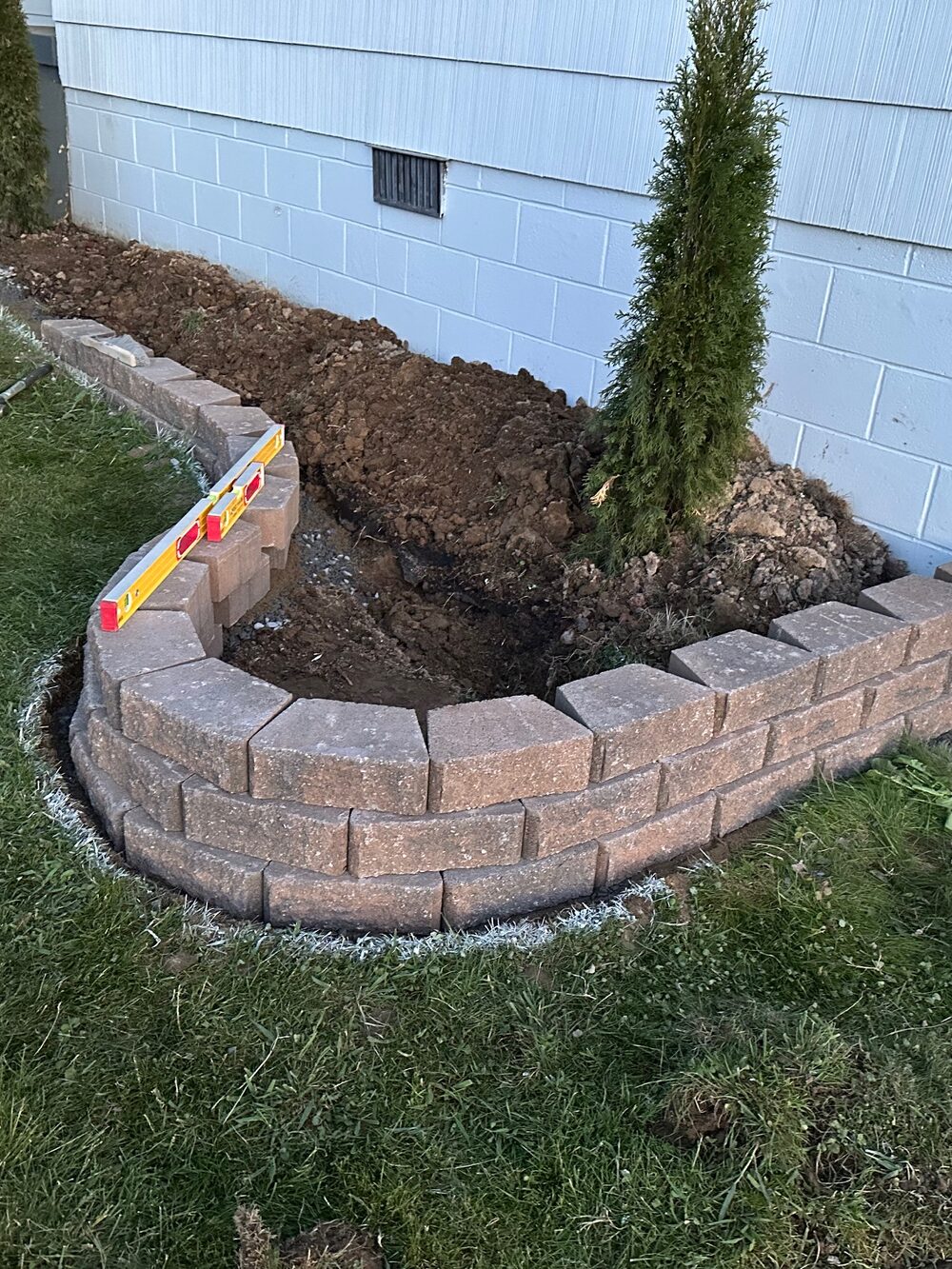 Completed curved garden retaining wall