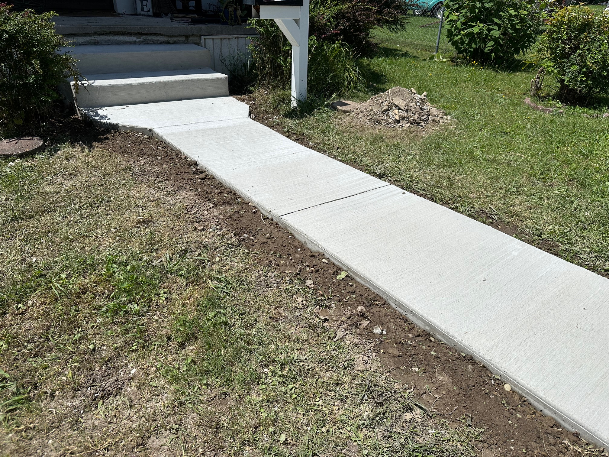 New concrete front steps and walkway