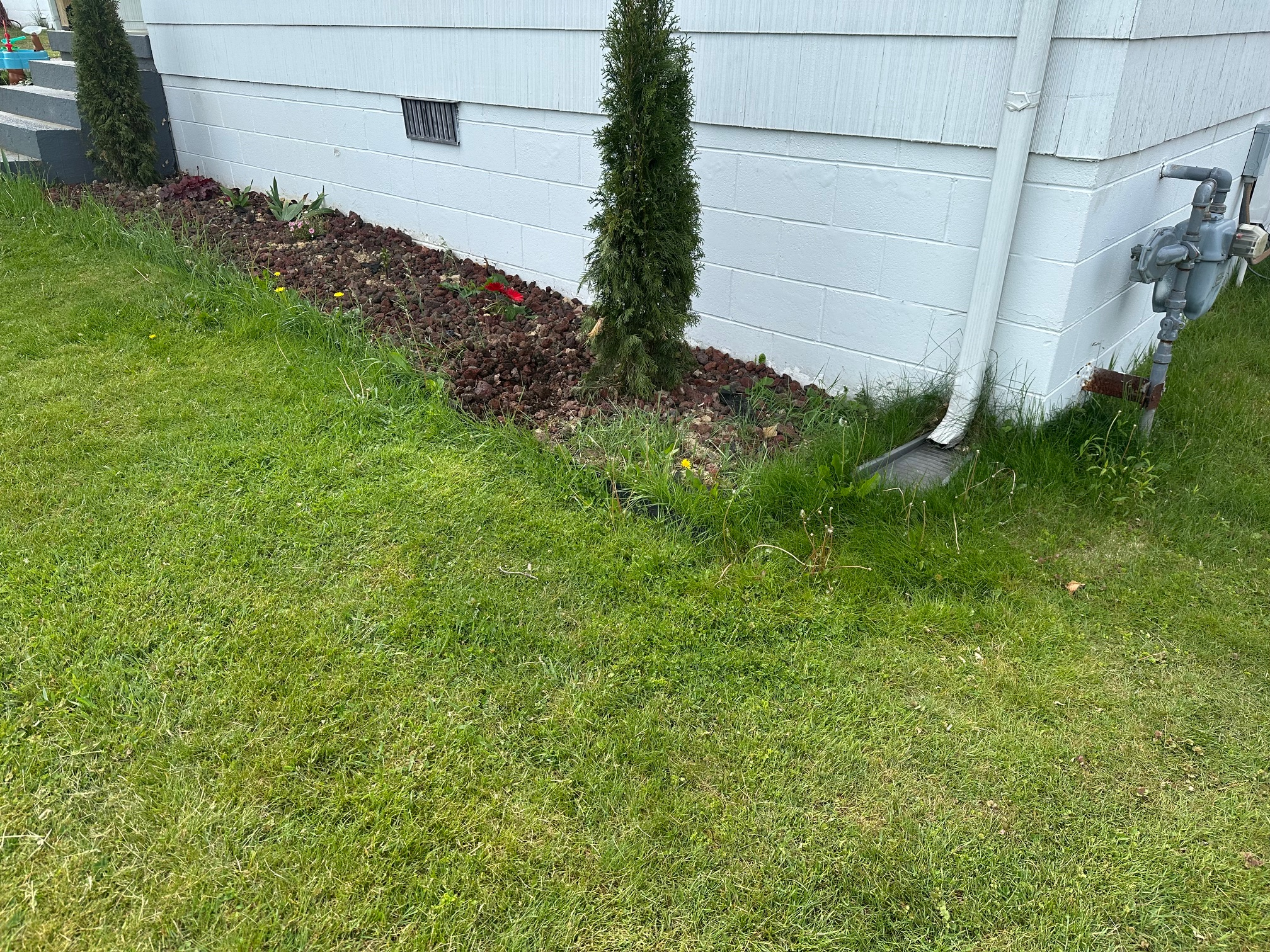 Garden bed before retaining wall